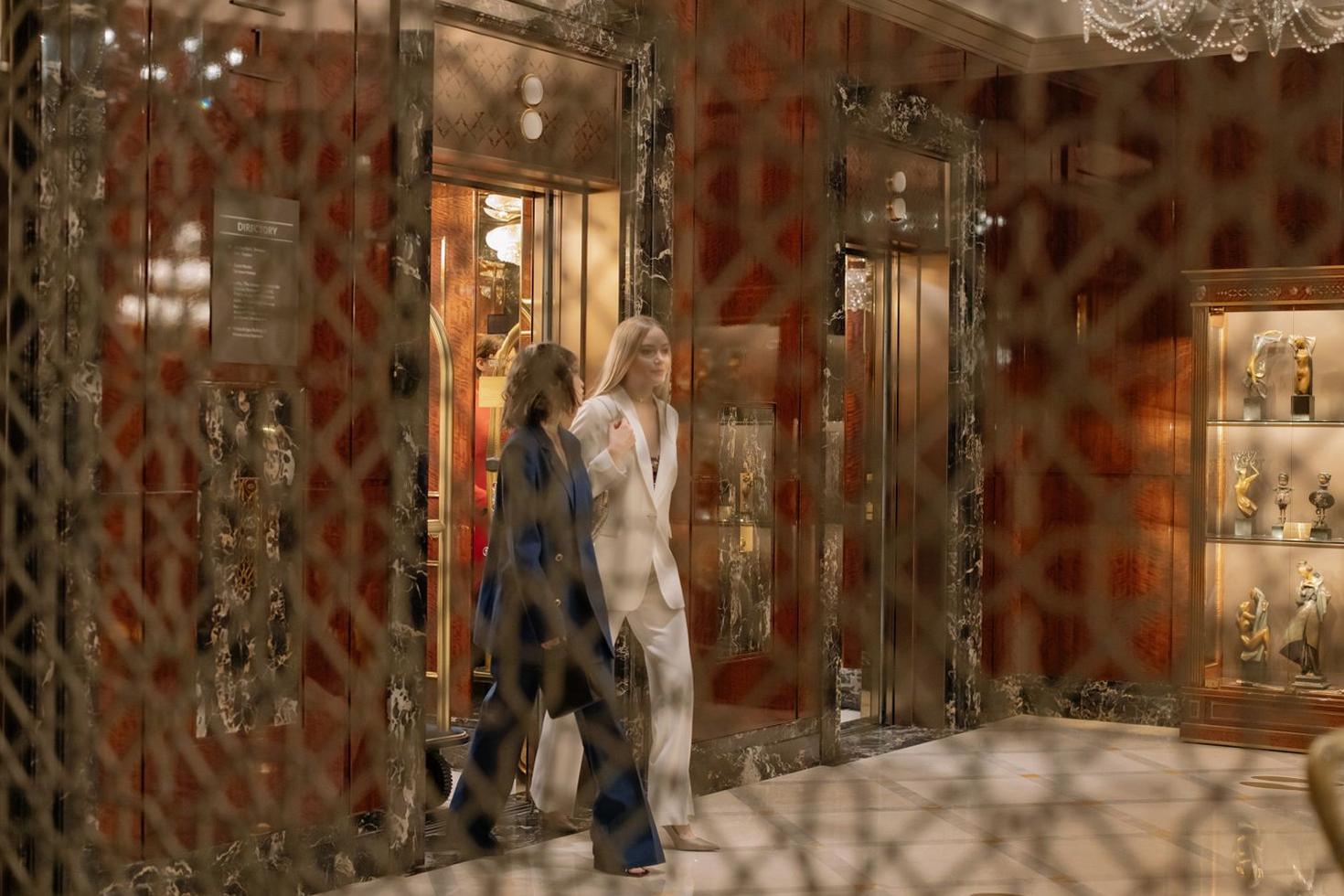 Guests in stylish hotel hall